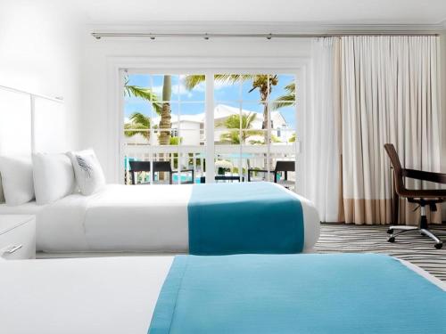 Voodi või voodid majutusasutuse The Marker Key West Harbor Resort toas