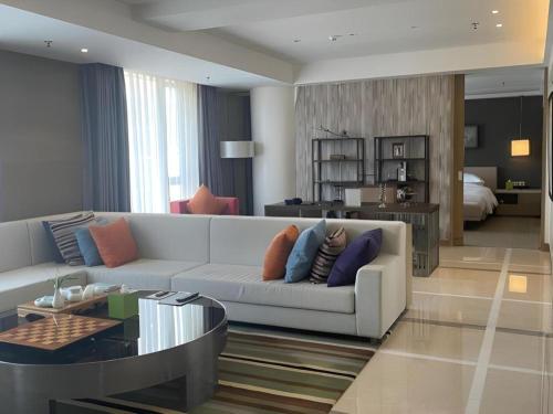 Гостиная зона в Xiamenair Maple Hotel (Xiamen SM City Plaza)