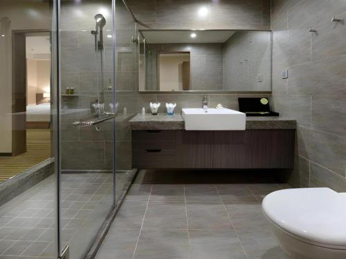 Ванная комната в Xiamenair Maple Hotel (Xiamen SM City Plaza)