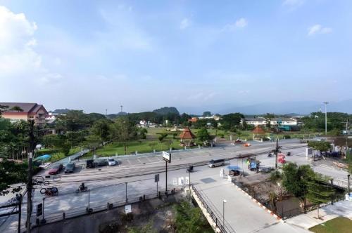 an aerial view of a street with cars on the road at Le Park Hotel in Nakhon Si Thammarat