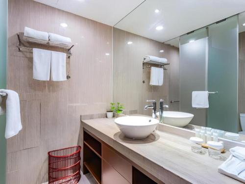 Koupelna v ubytování Jinjiang Metropolo Shaoxing Keqiao Wanda Plaza