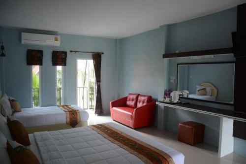 Postel nebo postele na pokoji v ubytování Satun Boutique Resort