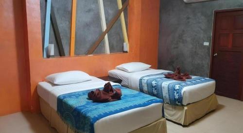 Letto o letti in una camera di Saikaew Boutique Hotel