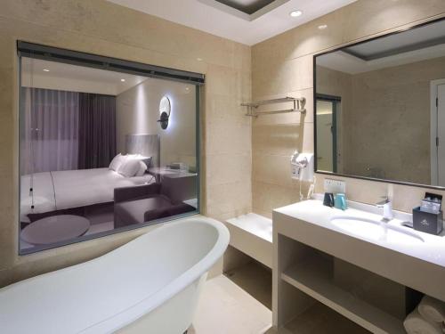 Koupelna v ubytování Magnotel Hotel·Shanghai Xintiandi
