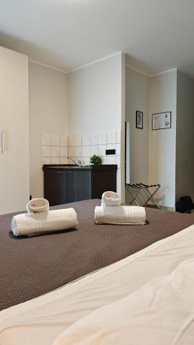 Hice Room Lungomare Fronte Mareにあるベッド