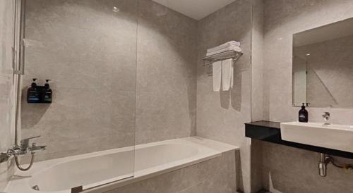 Ванная комната в Butterfly Hotel Betong