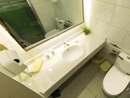 Ένα μπάνιο στο GreenTree Inn Maanshan Hanshan District Jiuwu Square Hotel