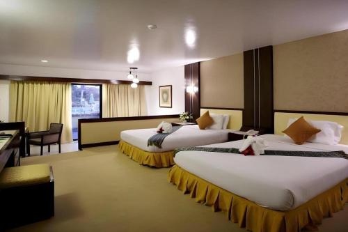 Katil atau katil-katil dalam bilik di Pinehurst Golf Club and Hotel