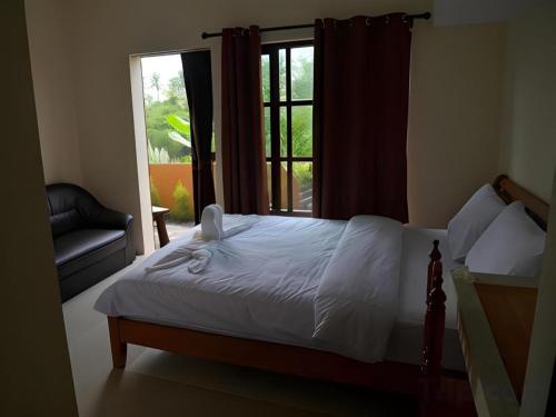 Ένα ή περισσότερα κρεβάτια σε δωμάτιο στο Sucholtee Resort