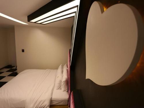 Cama o camas de una habitación en Java Hotel
