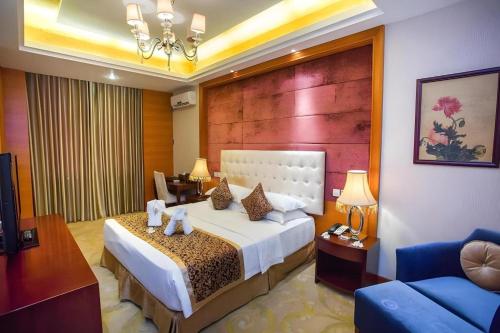 Ένα ή περισσότερα κρεβάτια σε δωμάτιο στο Dork Jumpa Hotel