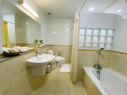 Koupelna v ubytování J Town serviced Apartments&hotel