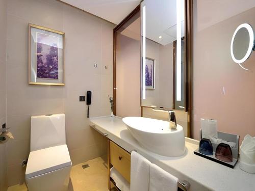 Koupelna v ubytování Lavande Hotel·Xishuangbanna Jinghong Songkran Square