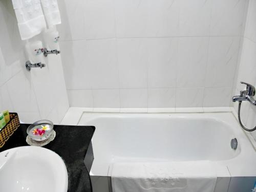 Phòng tắm tại Royal Hotel