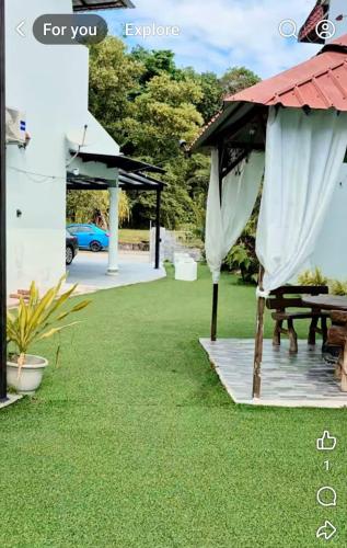 Κήπος έξω από το Mairahomestay Tambun