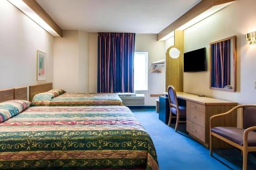 Katil atau katil-katil dalam bilik di Rodeway Inn