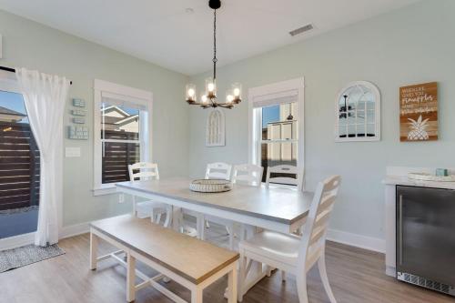 a dining room with a table and chairs at BCW30A - Waves Inn in Corolla