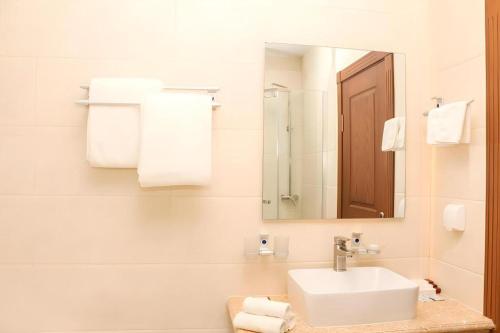 Koupelna v ubytování Mika Hotel