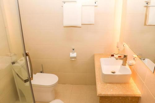 Koupelna v ubytování Mika Hotel