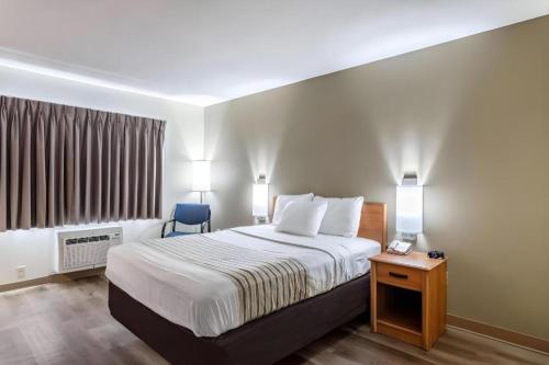 Ένα ή περισσότερα κρεβάτια σε δωμάτιο στο Econo Lodge Ithaca Airport