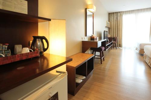 Posezení v ubytování Le Patta Resort & Hotel Chiang Rai