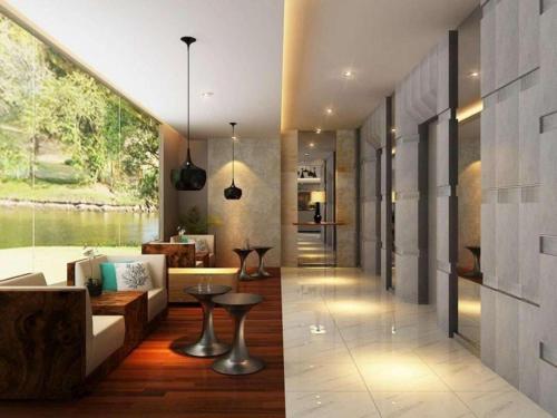 a hallway of a house with a living room at Bogor Valley Hotel in Bogor