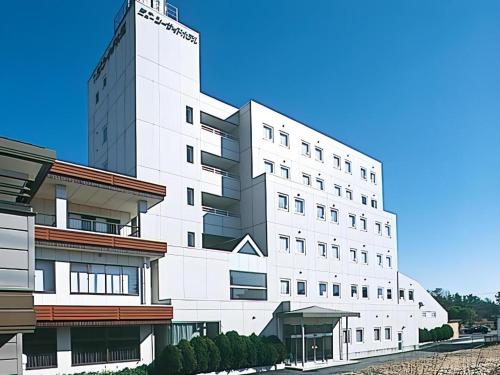 a rendering of a white building at Shirako New Seaside Hotel in Shirako