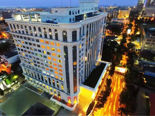 an overhead view of a large building in a city at Adimulia Hotel Medan in Medan