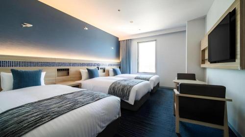 Goto Tsubaki Hotelにあるベッド