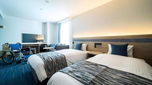 Goto Tsubaki Hotelにあるベッド