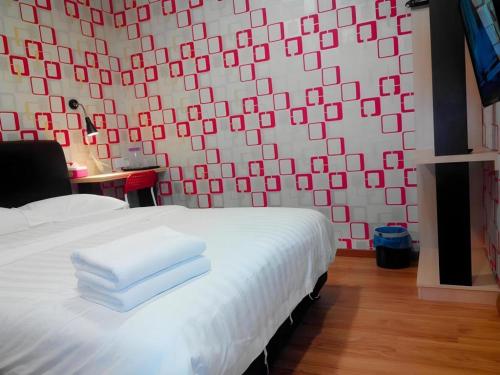 Un ou plusieurs lits dans un hébergement de l'établissement Hotel Zamburger Enstek