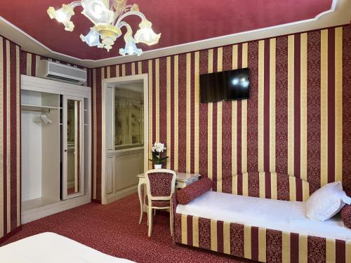 Postel nebo postele na pokoji v ubytování Hotel Alcyone