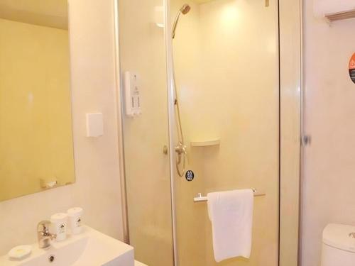 Salle de bains dans l'établissement GreenTree Inn Xuzhou High Speed Railway Zhangqian Square Business Hotel