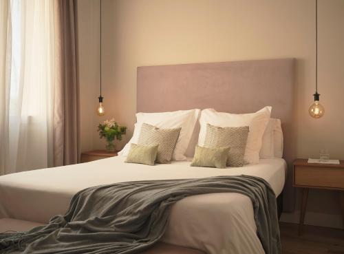 Кровать или кровати в номере Hotel Real Segovia by Recordis Hotels