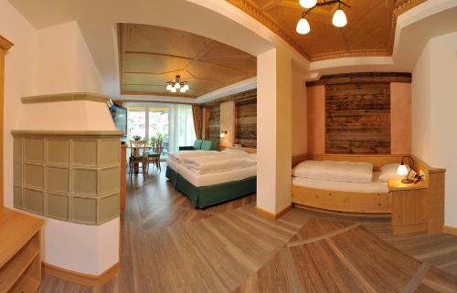 Postel nebo postele na pokoji v ubytování Hotel Sureghes