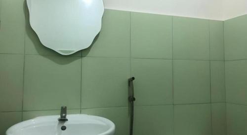 Ένα μπάνιο στο Marion's Inn Bldg 2 Bantayan powered by Cocotel