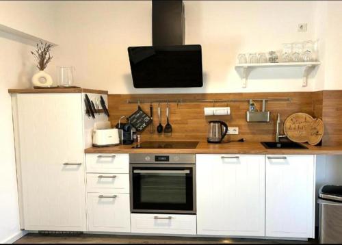 Kuchyň nebo kuchyňský kout v ubytování Exklusive Wohnung Mit Ahrblick 2