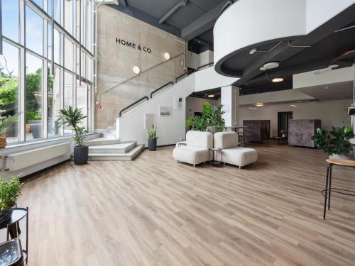Un lugar para sentarse en Home and CoLiving Bonn I Aparthotel
