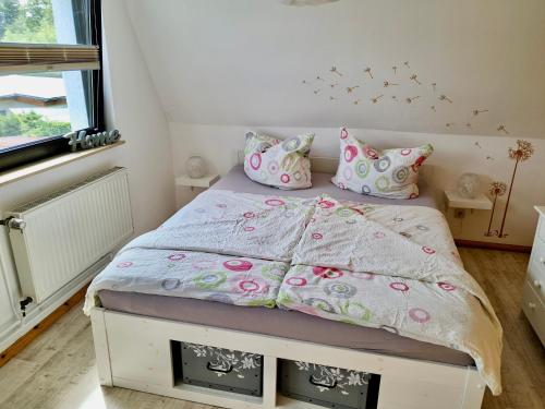 Postel nebo postele na pokoji v ubytování Ferienhaus Borgwall - 50 Meter vom See