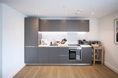 Η κουζίνα ή μικρή κουζίνα στο Leeds City Centre Luxury Penthouse with Private Terrace