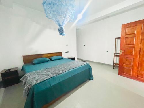 Llit o llits en una habitació de Bella Ella