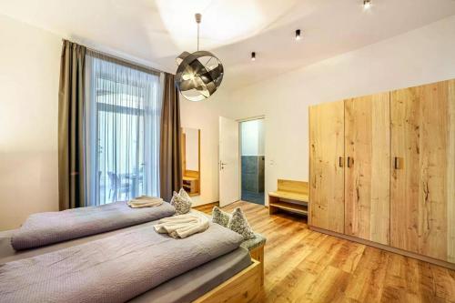 Postel nebo postele na pokoji v ubytování Appartements König