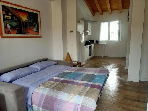 Ένα ή περισσότερα κρεβάτια σε δωμάτιο στο Residenza Stella