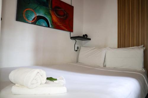 Ένα ή περισσότερα κρεβάτια σε δωμάτιο στο Casa Palmeira