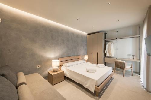 Katil atau katil-katil dalam bilik di Cala Theresìa - Exclusive sea front apartments