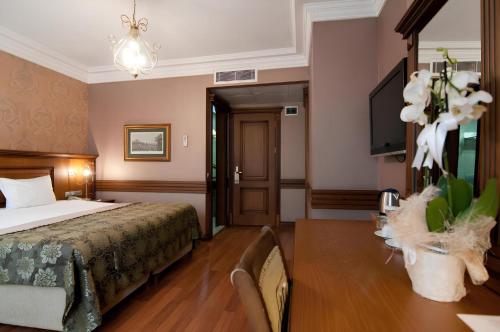 Postel nebo postele na pokoji v ubytování Ferman Hotel Old City -Special Category