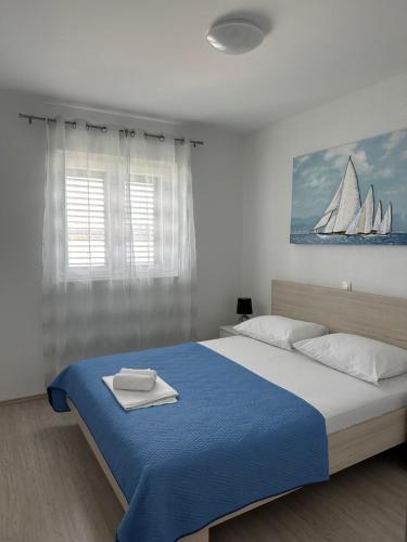 Postel nebo postele na pokoji v ubytování Seaside apartments Polić, Rogoznica