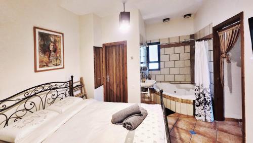 Ένα ή περισσότερα κρεβάτια σε δωμάτιο στο North valley winery suite