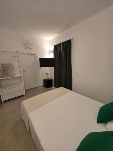 Postel nebo postele na pokoji v ubytování B&B Casa Cappuccini