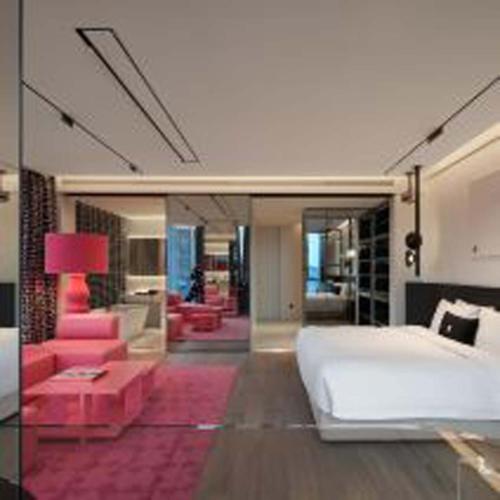 Postel nebo postele na pokoji v ubytování Yashan Tianlai S Hotel (Taikoo Li Chengdu Branch)